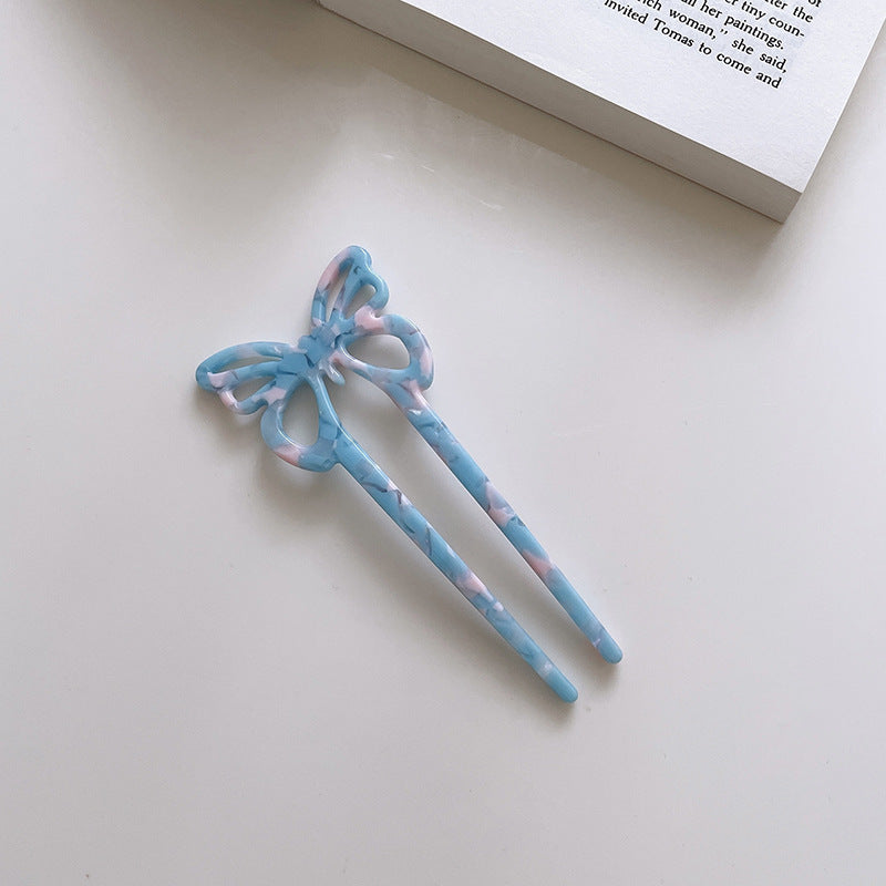 Modische Schmetterlingsbutter -Haarnadel -Locken