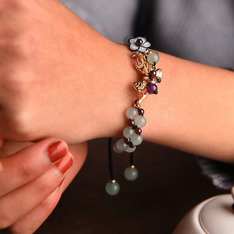 Braided aventurine bracelet with iris and gemstone design