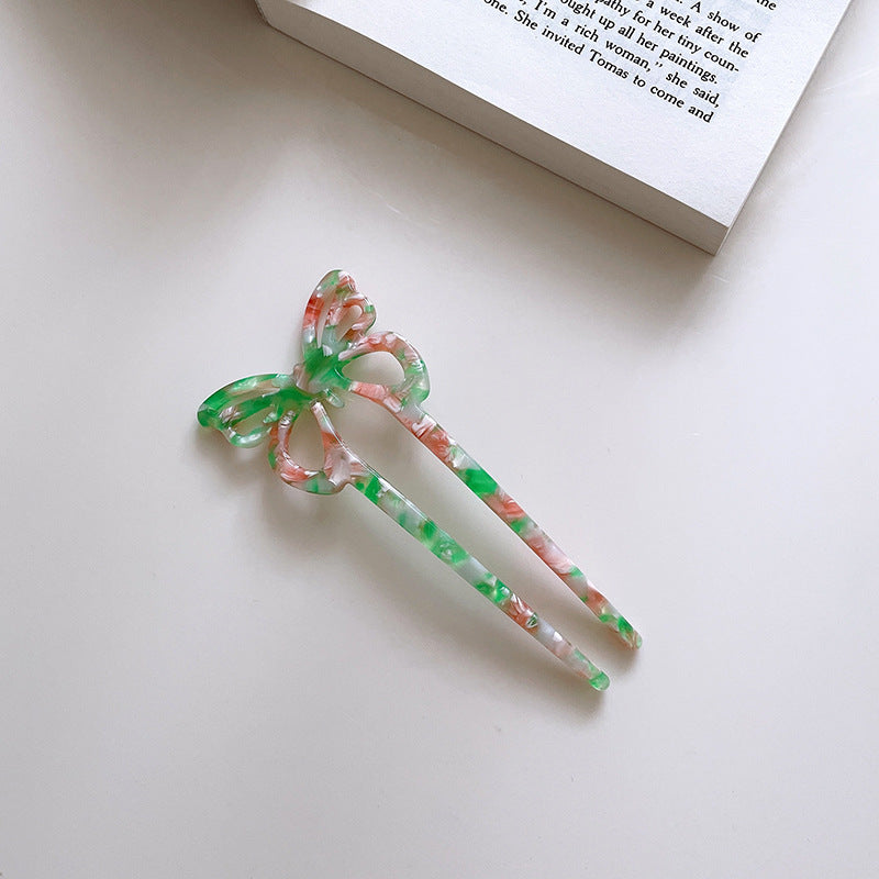 Modische Schmetterlingsbutter -Haarnadel -Locken