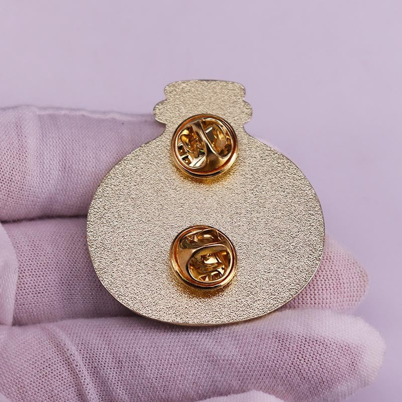 Gold copper animal brooch pin with cartoon-style design