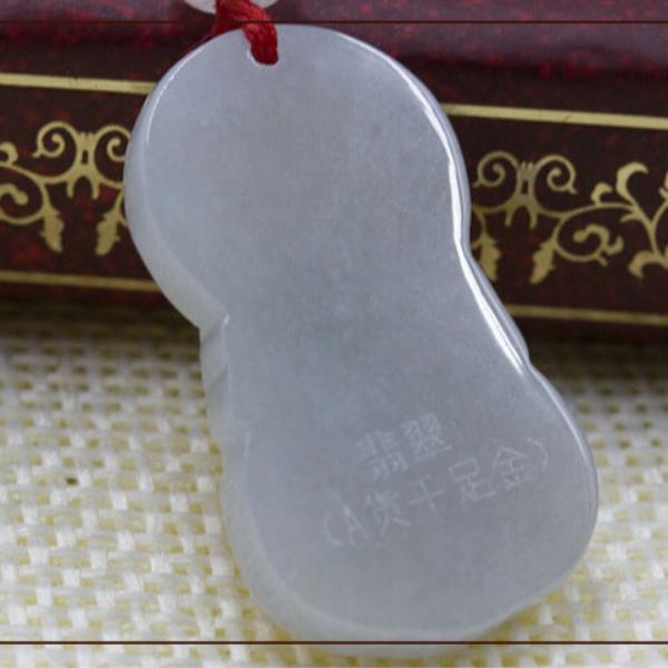 Gold inlaid jade pendant