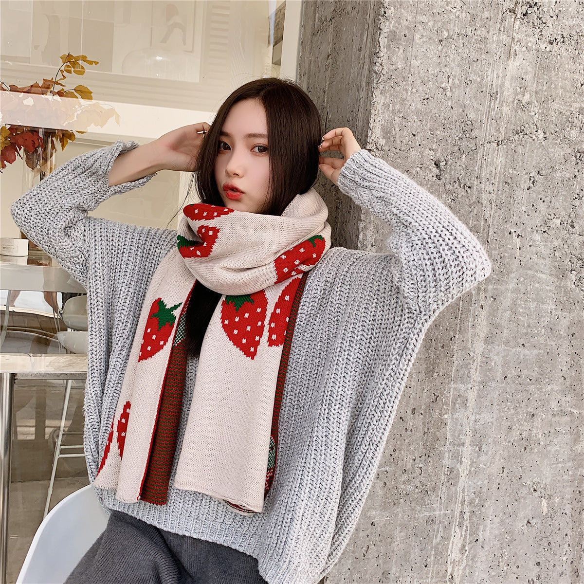 Long strawberry knitted scarf