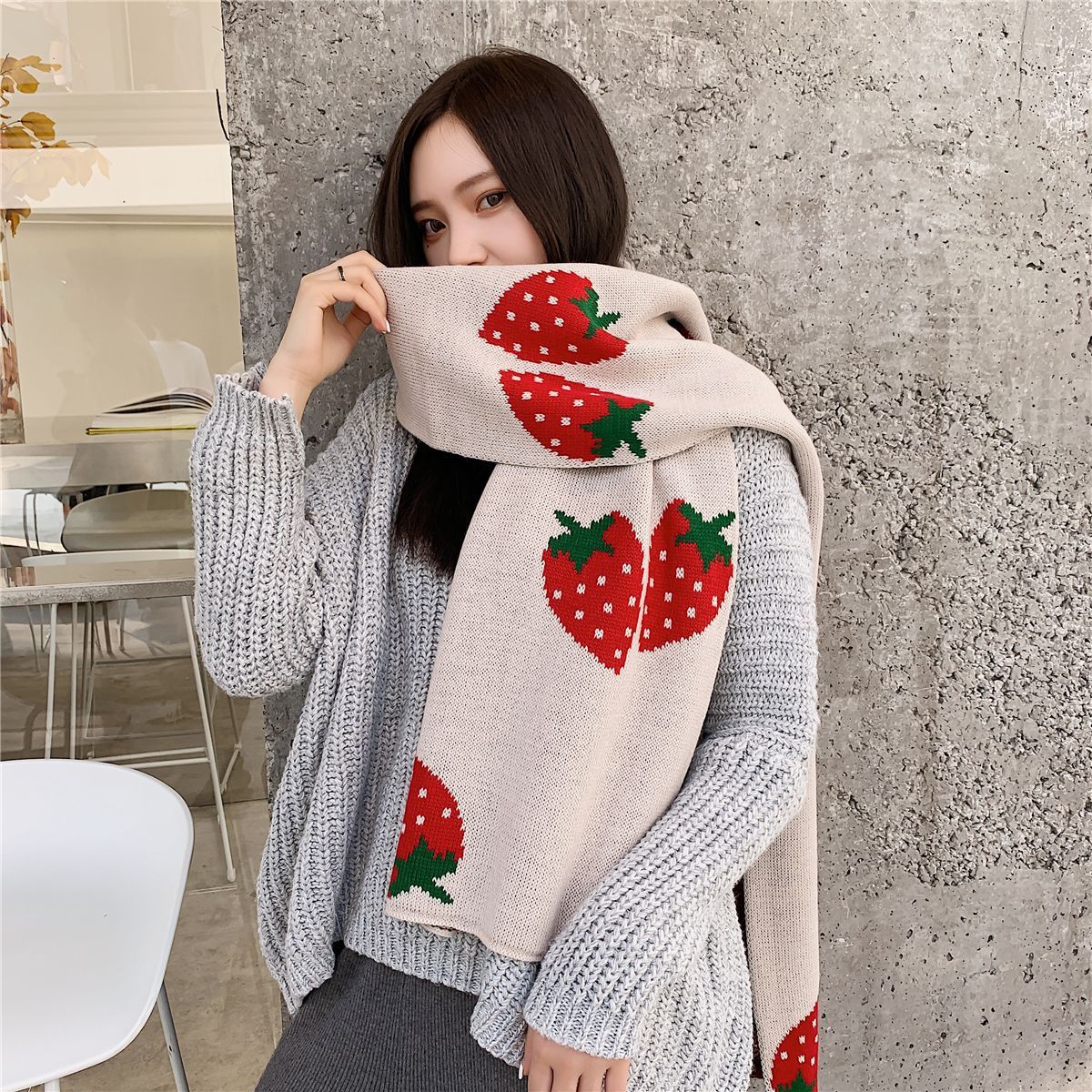 Long strawberry knitted scarf