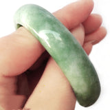 Floating green jade bracelet