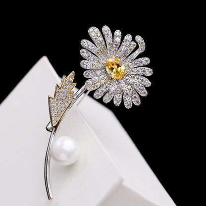 Electroplated gold pearl brooch