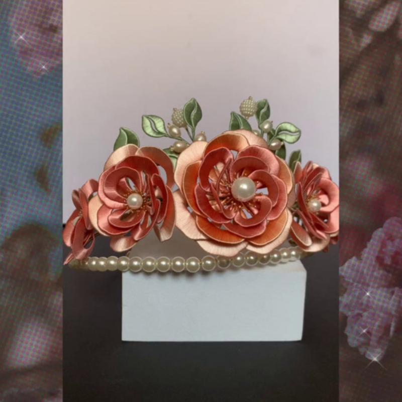 Blumenfesteshaarkronen mit Blumenhaarnadel verpackt