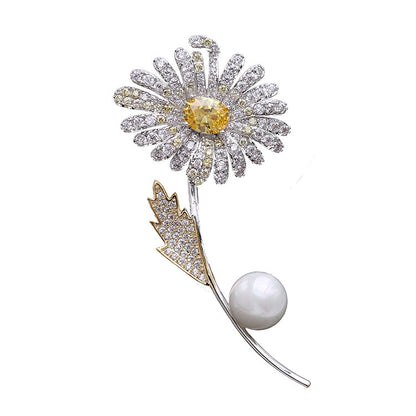 Electroplated gold pearl brooch