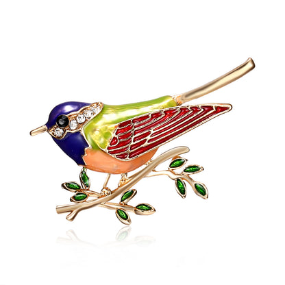 Point drill bird branch brooch