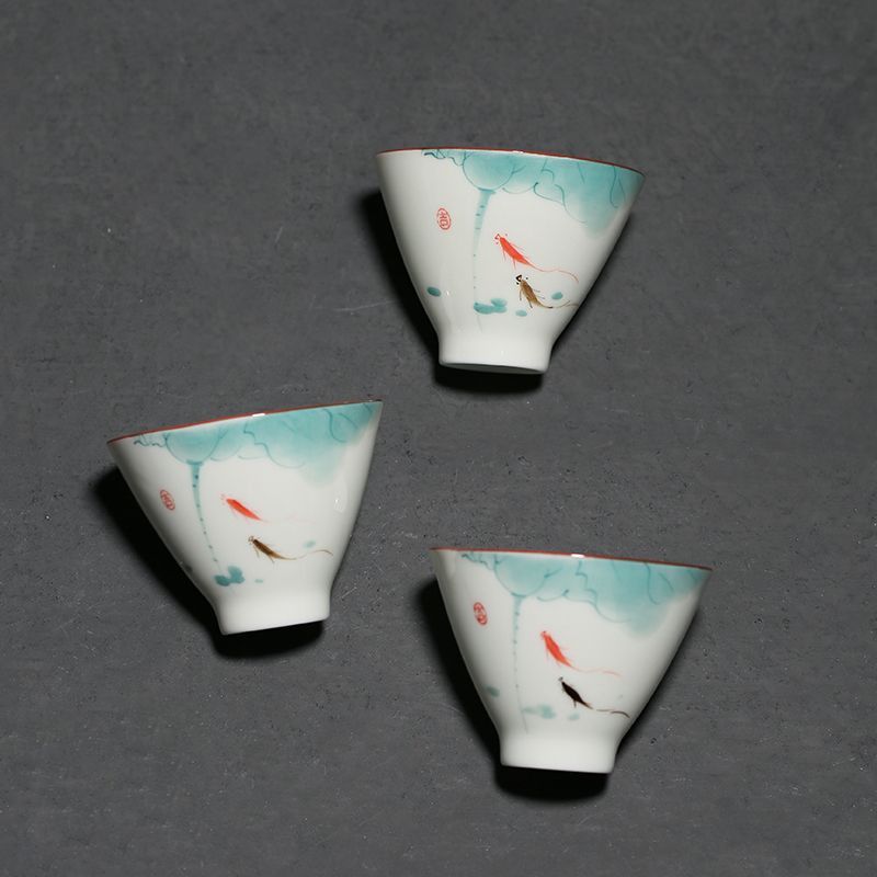 Hand Painted Fish Play Underglaze Porcelain Tea Cup