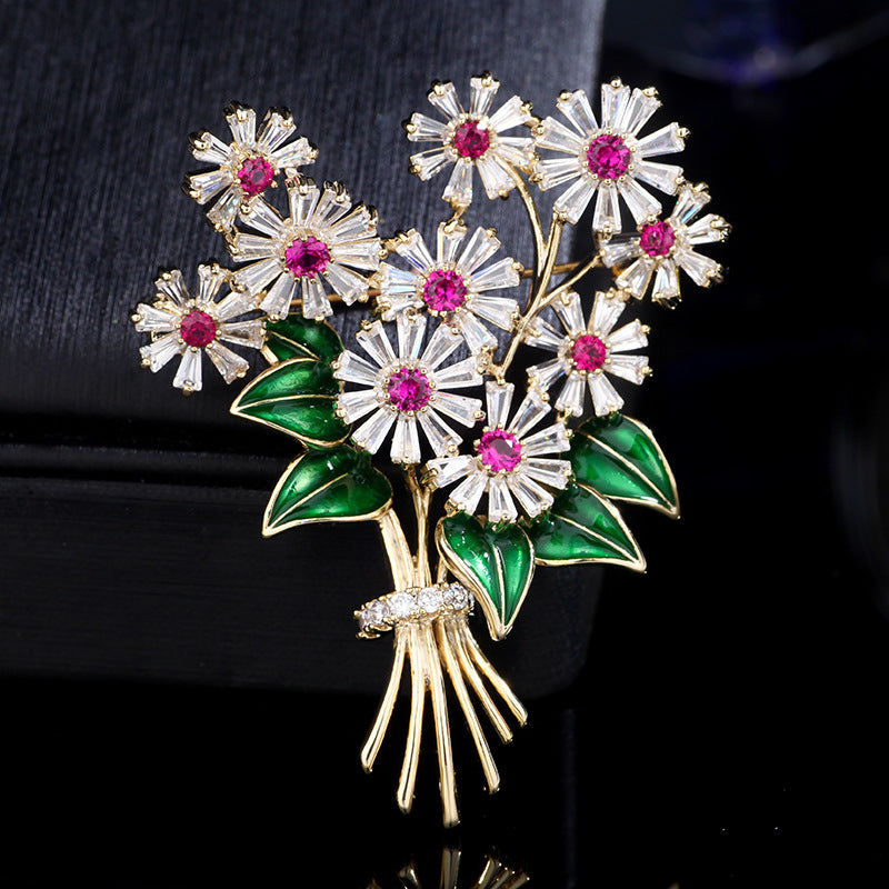 Dripping flower brooch