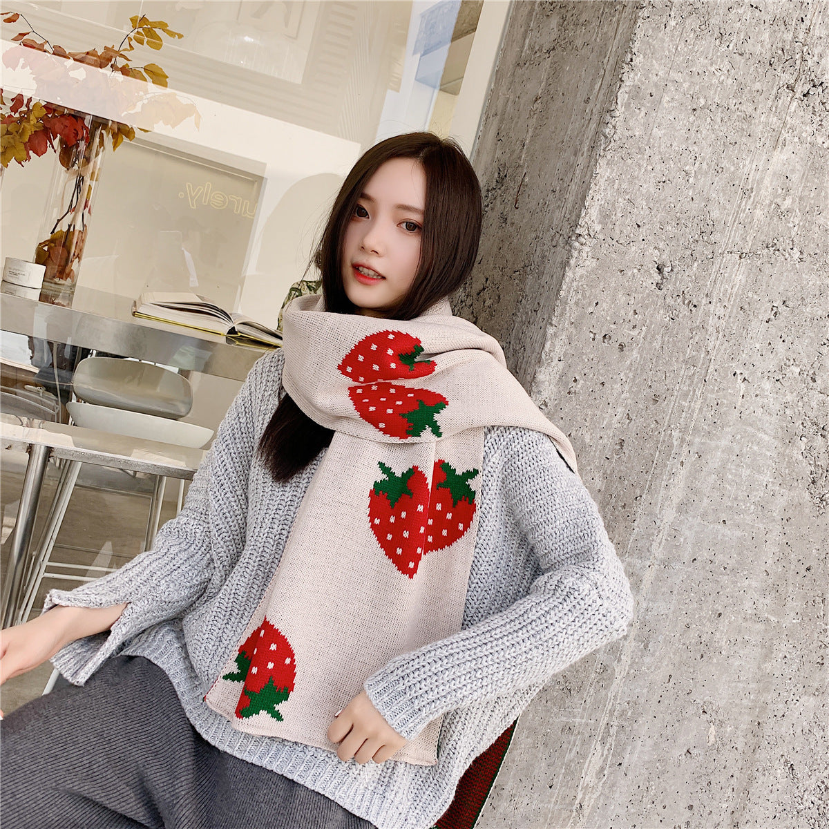 Long strawberry knitted scarf