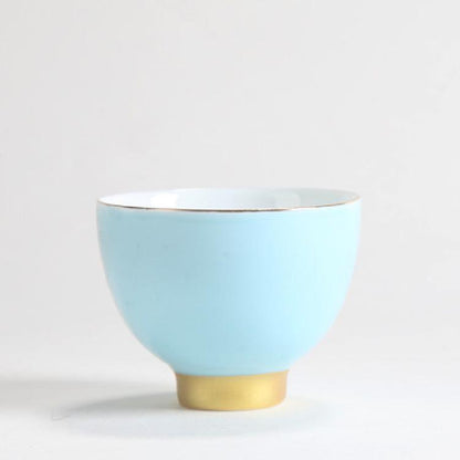 Tracing gold ceramic teacup