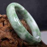 Floating green jade bracelet