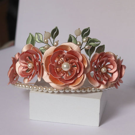 Blumenfesteshaarkronen mit Blumenhaarnadel verpackt