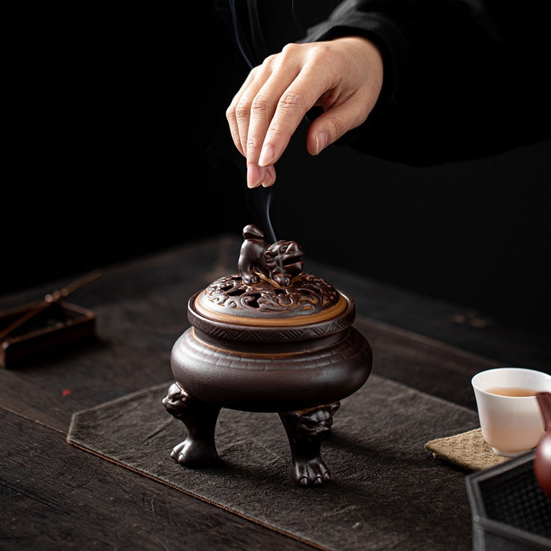 Antique ceramic incense burner with tripod lion base